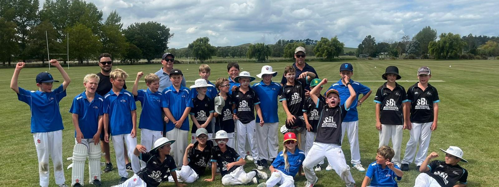 Taupō and Central Hawke's Bay junior players celebrating together after a game