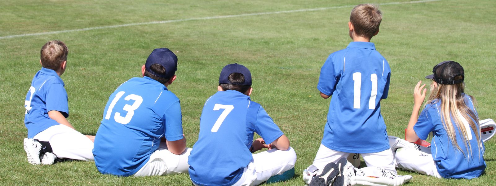 Taupō players supporting their team from the boundary